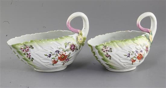 A pair of Derby leaf-moulded sauceboats, c.1758, l. 18.5cm, losses to leaves
